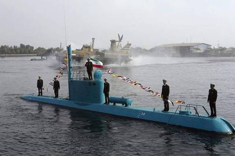 Gulf Menace: An Iranian Ghadir-class mini submarine moves into the Arabian Gulf from the southern port of Bandar Abbas last November. The head of the United Arab Emirates' Navy said Iran's mini subs pose an imminent threat to maritime security in the region.