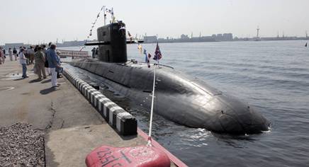 Visitors look at St Petersburg diesel electric submarine of the Lada class at the International Maritime Defense Show in St Petersburg. File photo