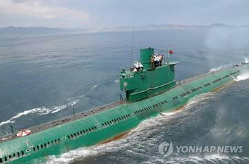 This Rodong Sinmun photo released on June 16, 2014, shows a submarine, which is presumed to be a 1,800-ton Romio-class submarine built in the 1950s. It is the largest submarine the communist North has. North Korean leader Kim Jong-un conducted a drill on board the submarine during his visit to the country's Naval Unit 167, which is stationed on the east coast. (Yonhap)     