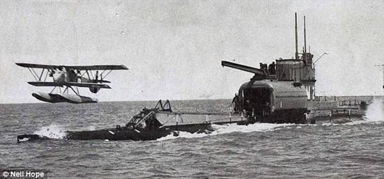 The M2 was one of four ¿M¿ class submarines put into service during WW1 and following the cessation of hostilities was modified to carry a small two-seater Parnell Peto biplane. Pictured is the HMS M2 in action